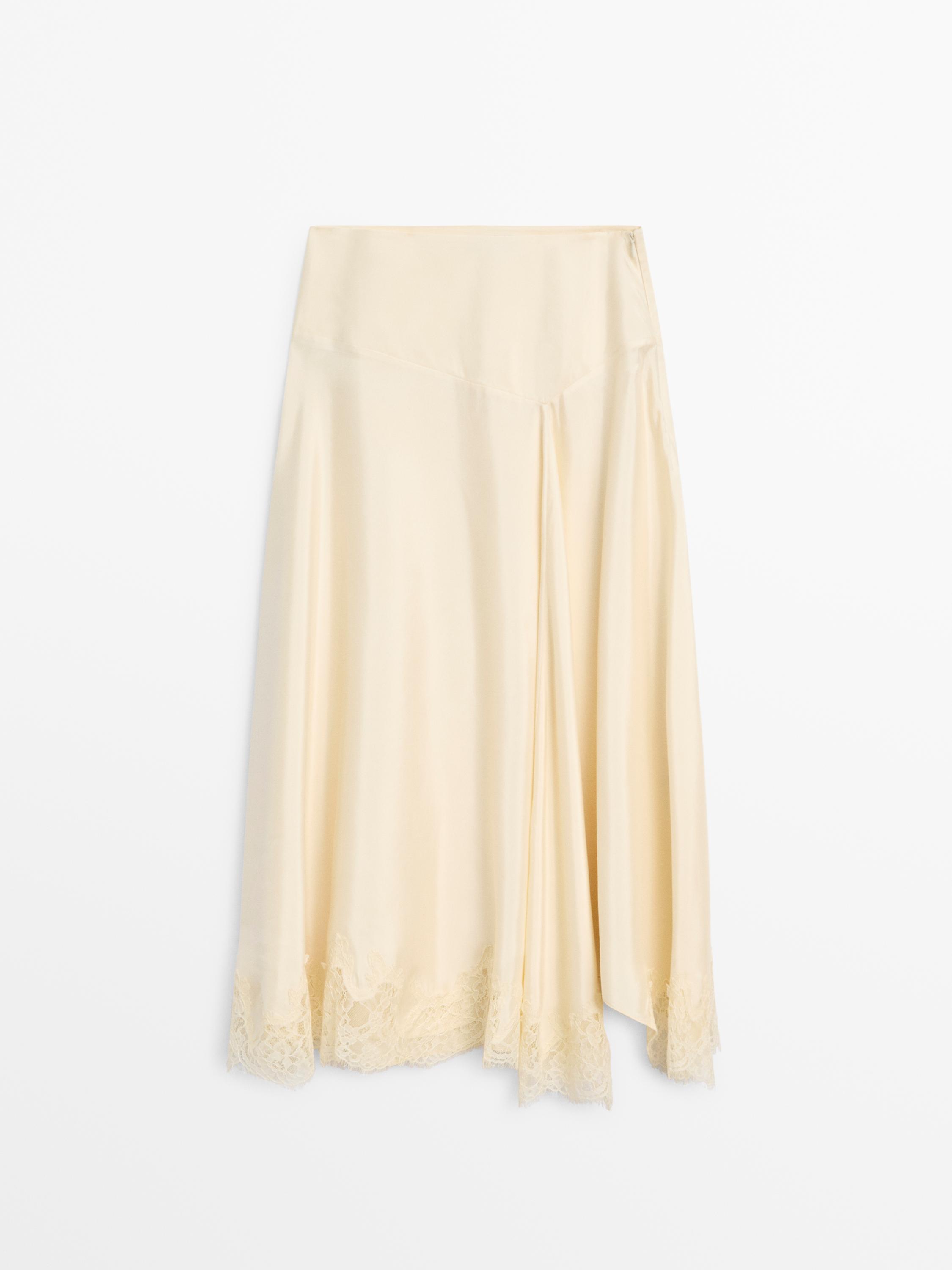 Jupe asymétrique détail lingerie